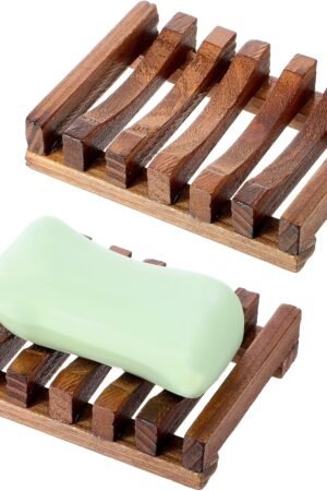 Two natural teak wooden soap dishes with slatted drainage design. One holds a light green soap bar. Compact size, water-resistant wood for bathroom, shower or sink use.